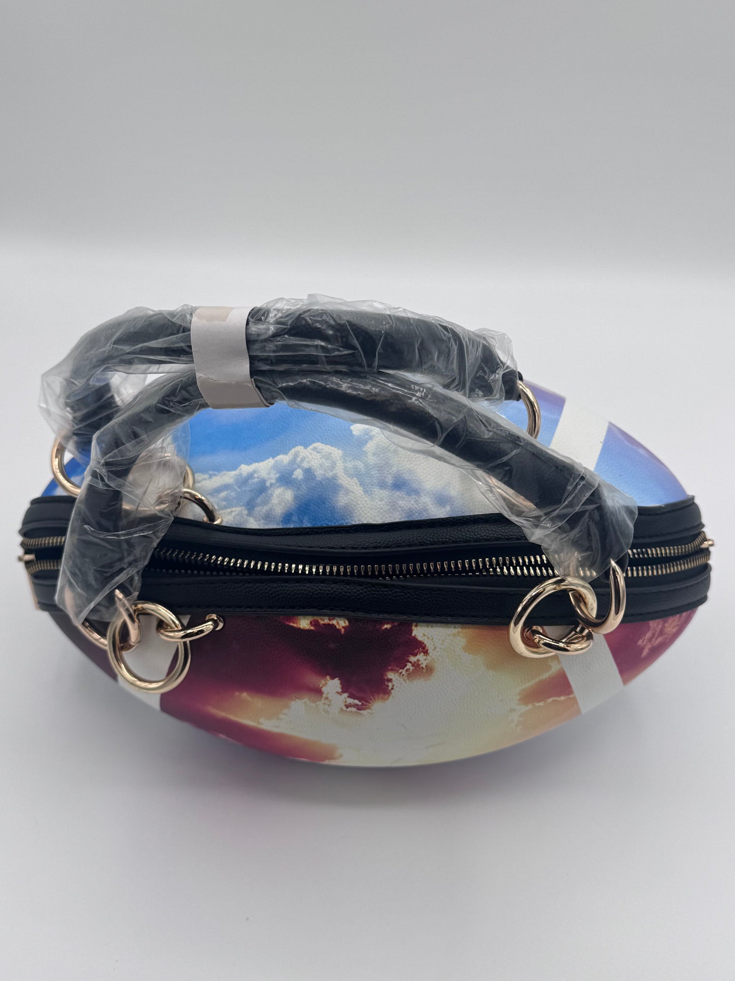 Caleesa Sunset Football Bag Purse