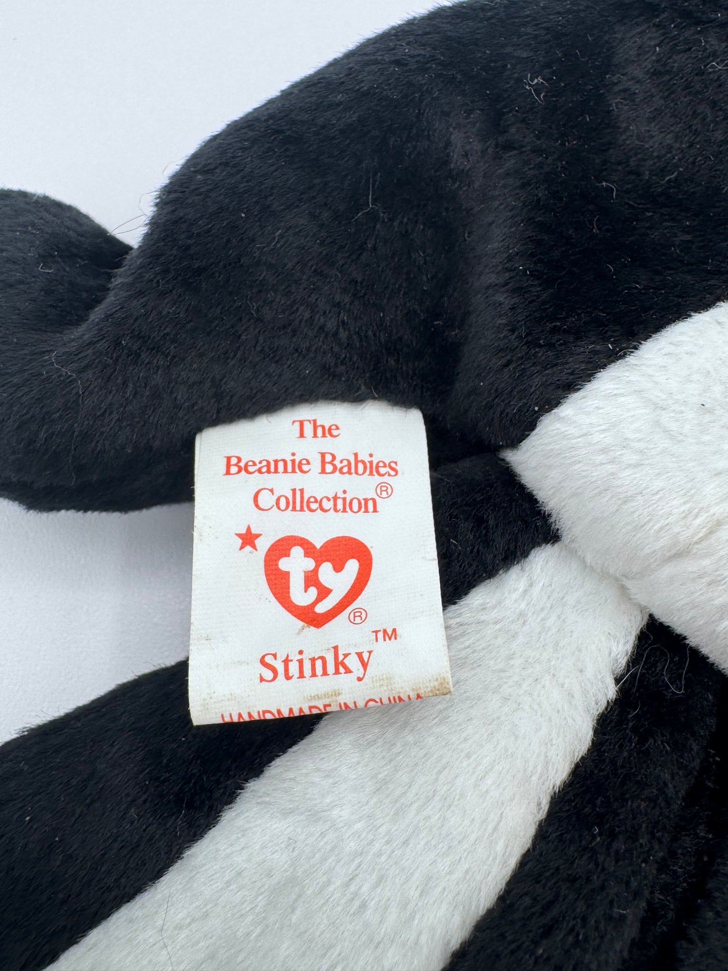 Beanie Baby TY - Stinky Hang Tag 5th Gen & Tush Tag 6th Gen